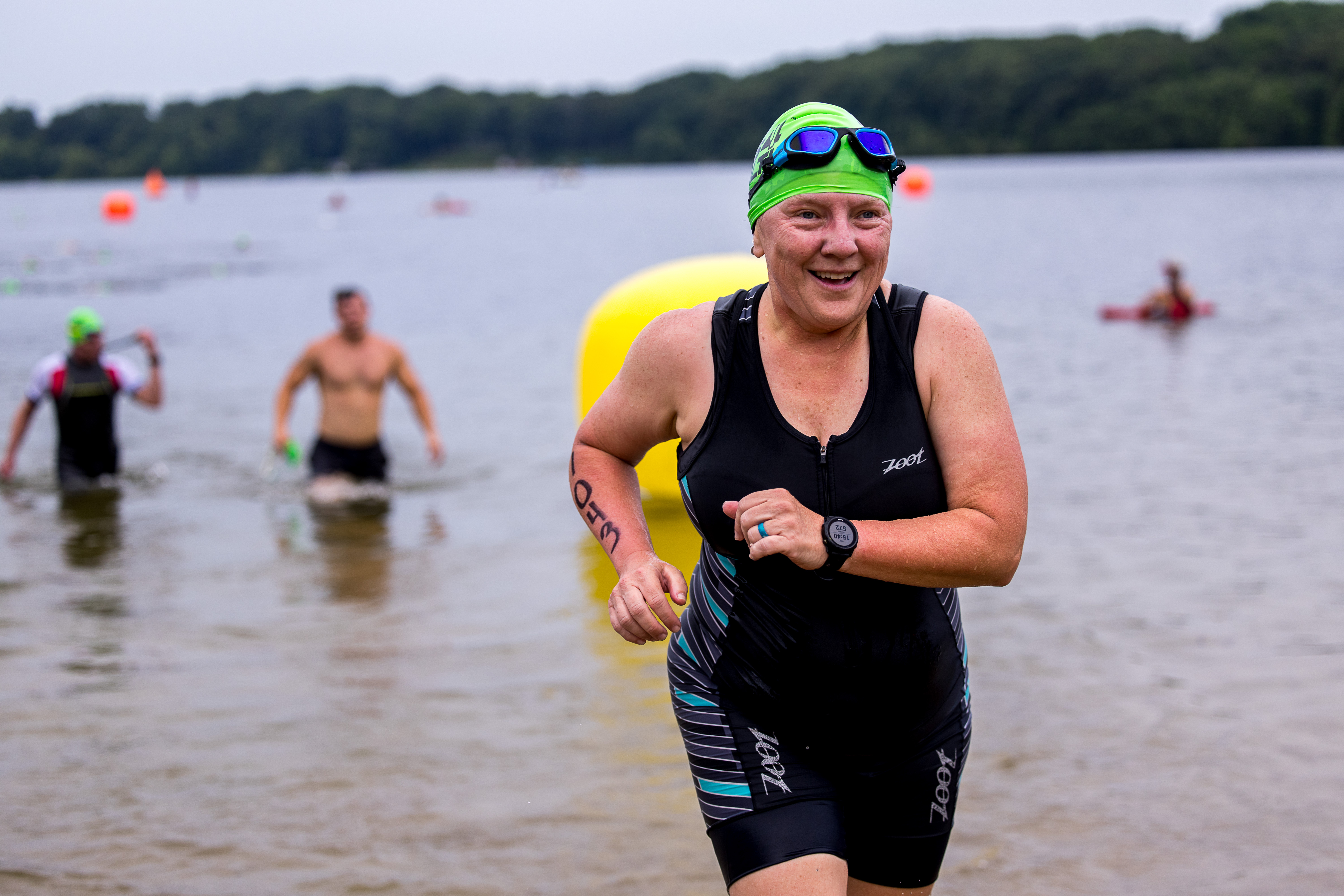 Smiling La Porte athlete coming out of the swim